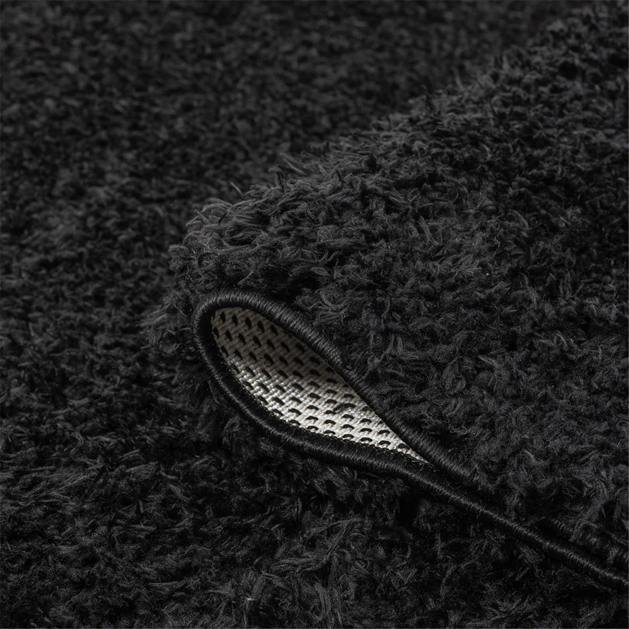 Fluffy and comfortable Ebony Plain Shag Rug