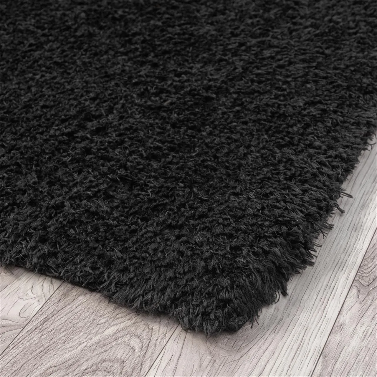 Fluffy and comfortable Ebony Plain Shag Rug