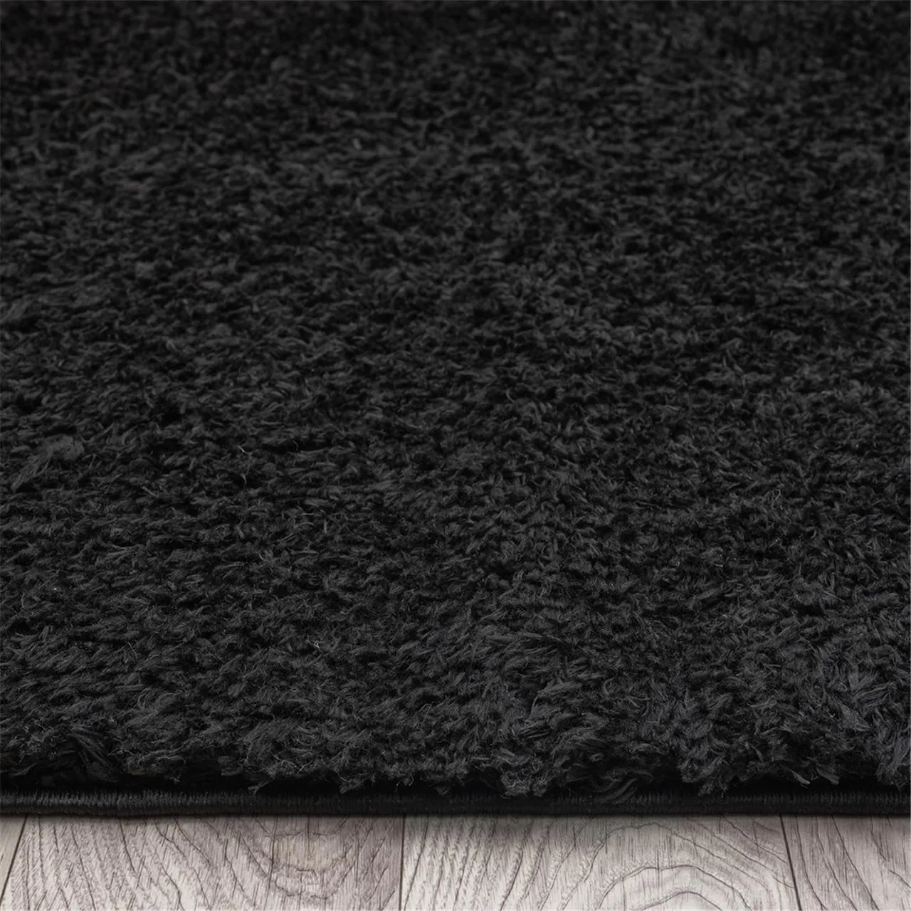 Fluffy and comfortable Ebony Plain Shag Rug